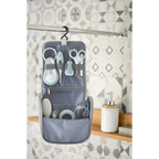 Beaba 9 Baby Toiletry & Grooming Essentials, Includes Thermometer, Hairbrush, Nail Clippers, Nasal Aspirator, Gum Massaging Toothbrush, Teether Baby Sciss, Bath Thermometer, Nail File, and Multi-Compartment Travel Pouch