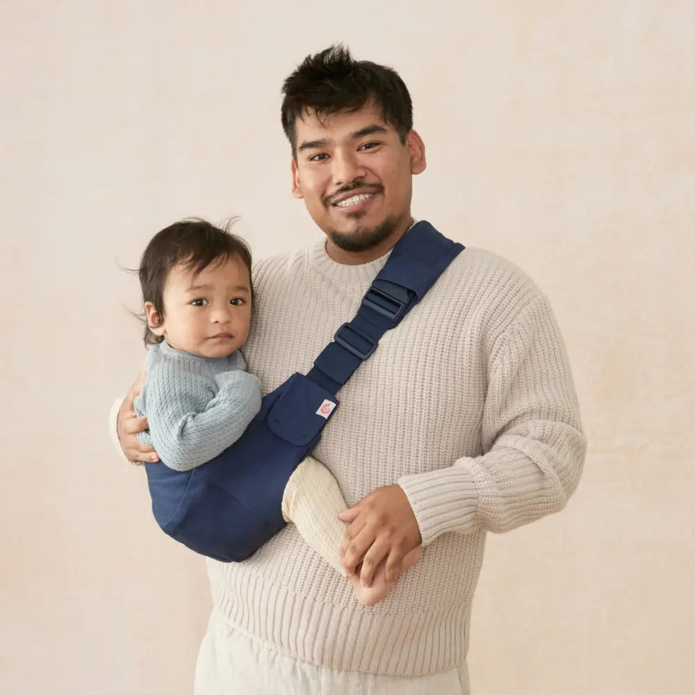 Ergobaby Upsie Sling Baby Carrier, Soft & Ergonomic Carrier with Cushioned Adjustable Shoulder Strap, Bucket Seat, Front Pocket, 100% Breathable Cotton, Perfect for Travel & Everyday Use, 6M - 4Years